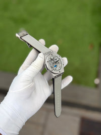 Men's Luxury Skeleton Style Watch with Moon Phase Dial – Silver Case & Light Gray Strap