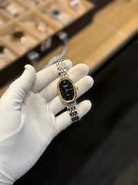 Elegant Black Dial Two-Tone Oval Analog Watch for Women